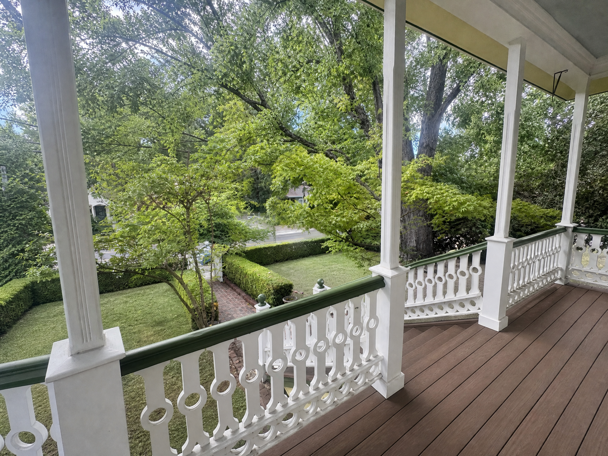 Wraparound porch overlooking the trees